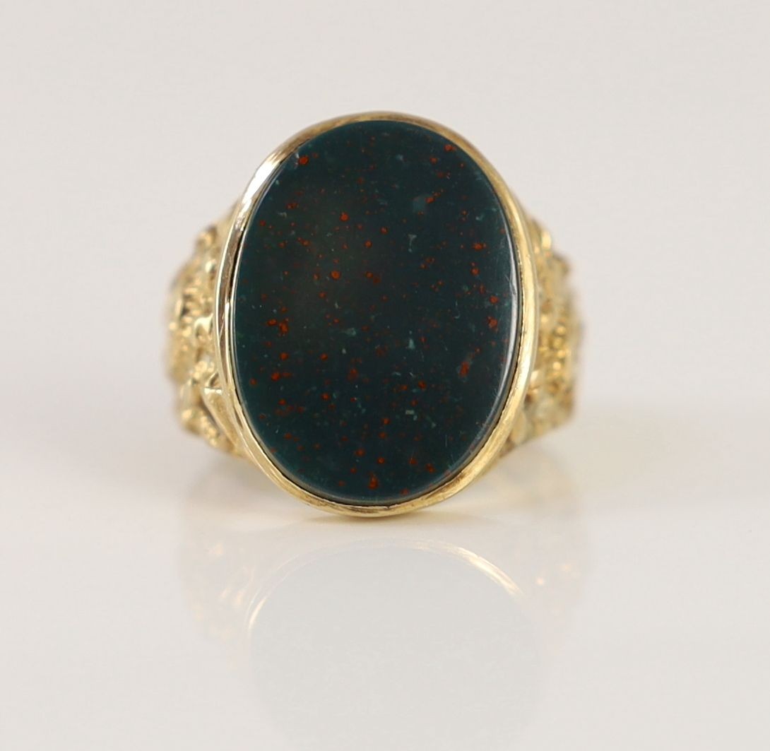 A 1970's 9ct gold and oval bloodstone set signet ring